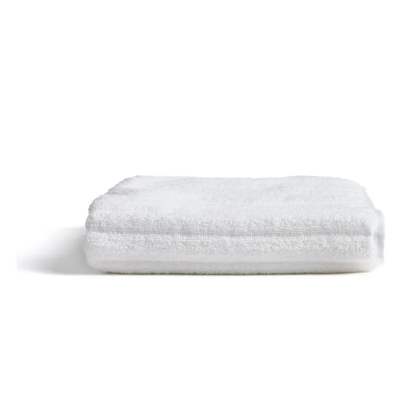 Do wyczerpania zapasów Biały bawełniany ręcznik frotte 50x90 cm Navira – Kave Home Bonami