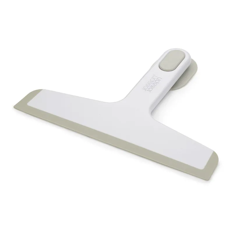 Biała ściągaczka z uchwytem 24 cm Duo – Joseph Joseph Bonami Dostępne od ręki
