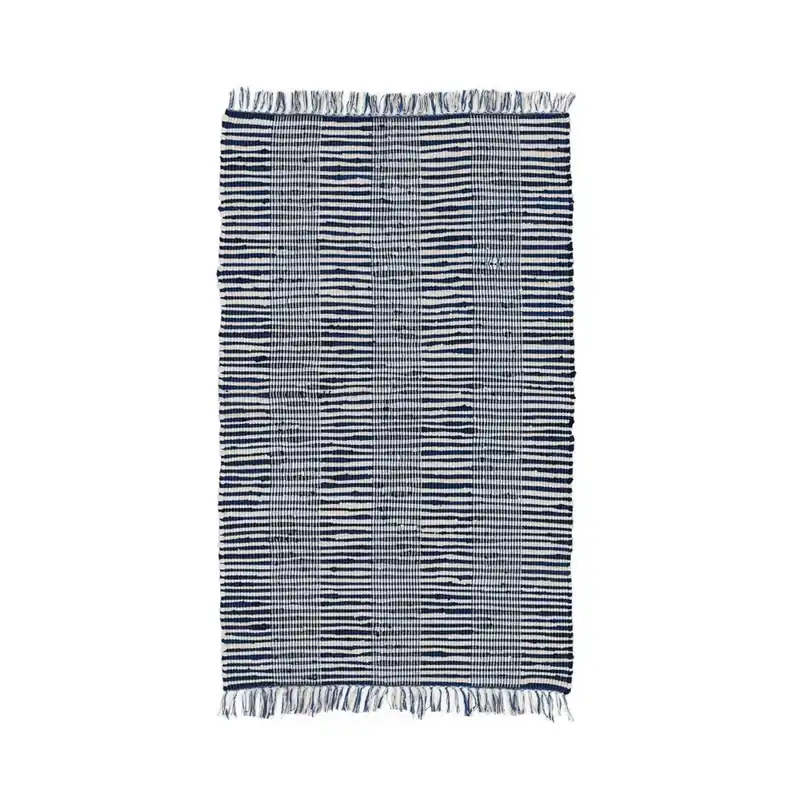 Niebieski dywan bawełniany Ixia Fringes, 150x90 cm Bonami Sprawdź teraz